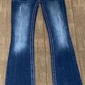 These are Mss Me Blue Boot Cut Jeans with Distressed Detailing 27x33